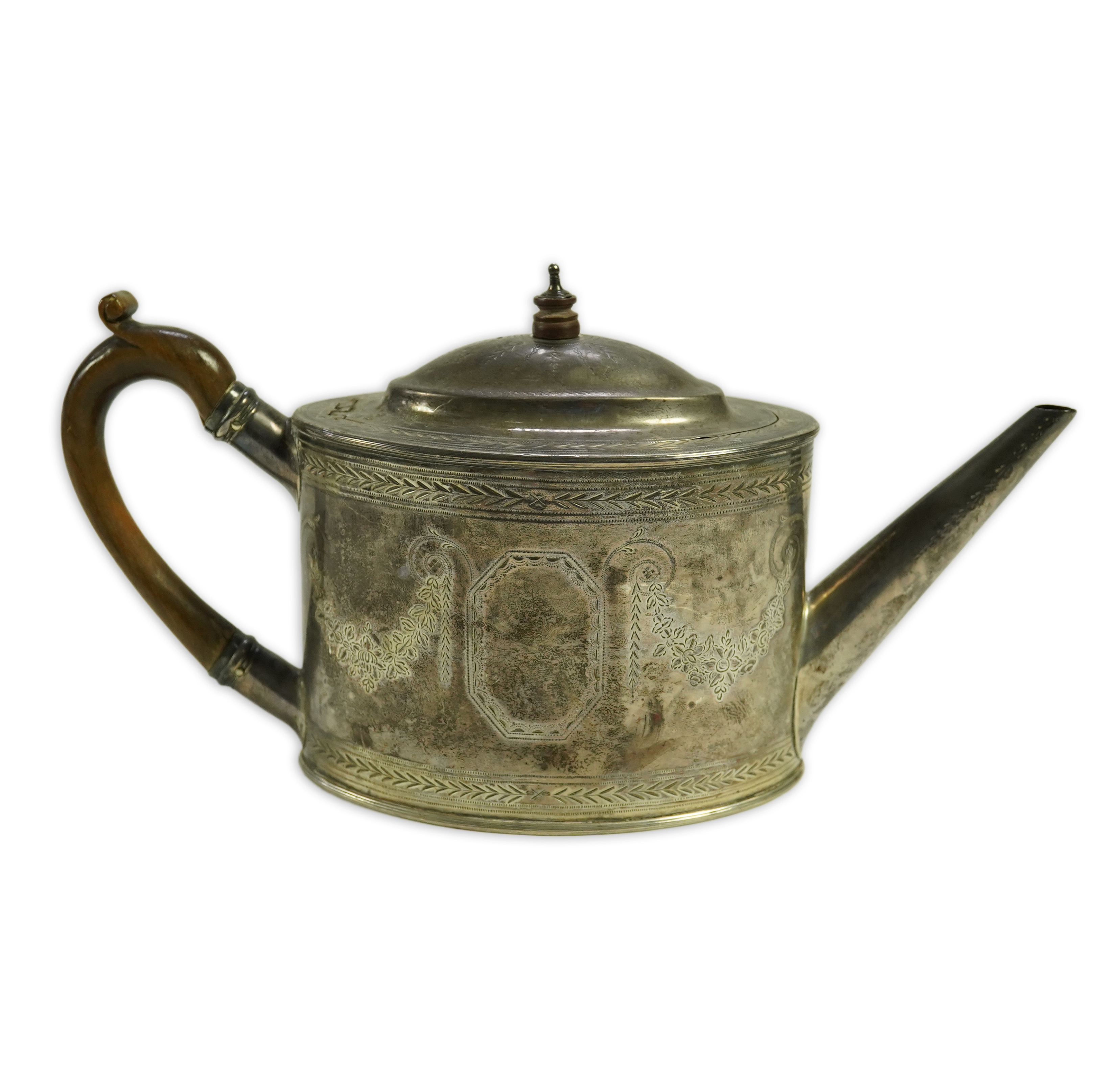 A George III silver oval teapot, overstruck maker's mark, T?